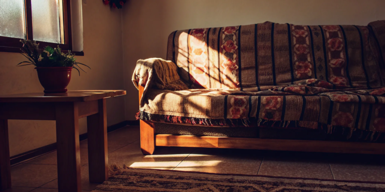 Dated living room details—don't fix everything when selling.