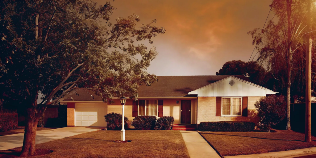 Cash home sale: Suburban house at sunset.