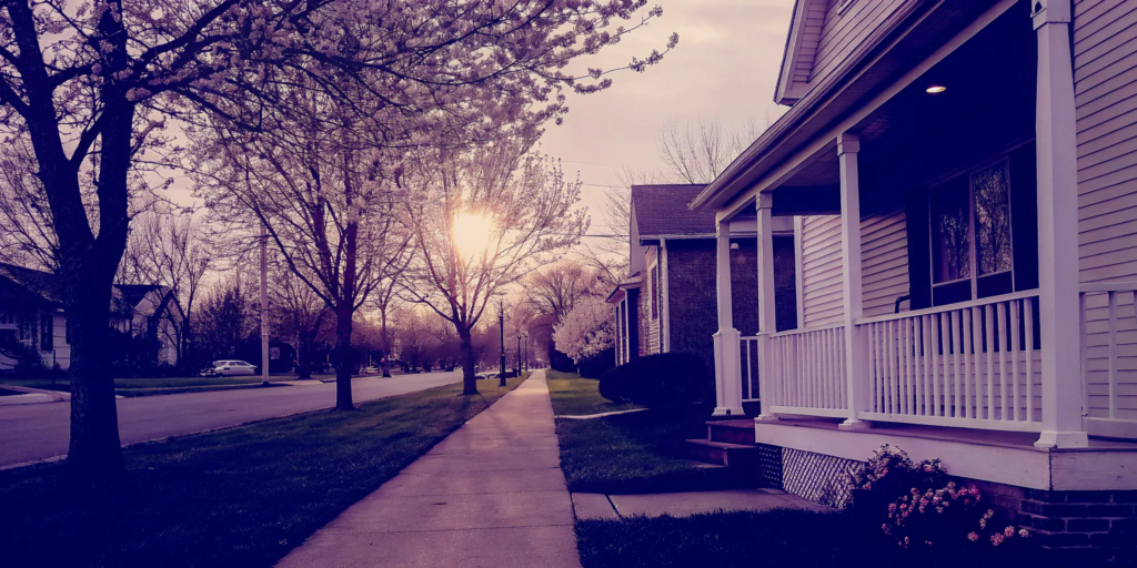 A suburban home at sunset, a guide on how to stop a foreclosure auction immediately.