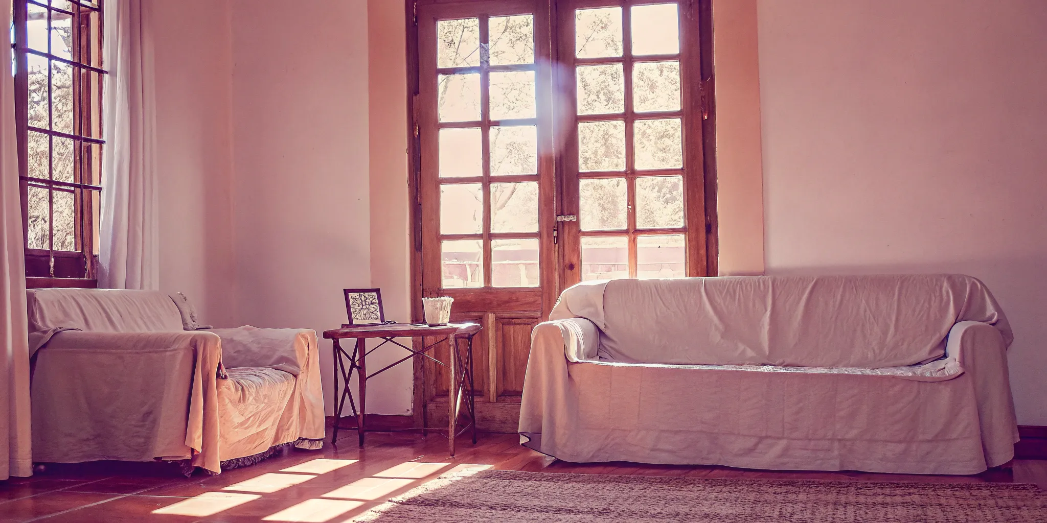 A bright living room in a house, showing why a cash offer is a better option for a seller.