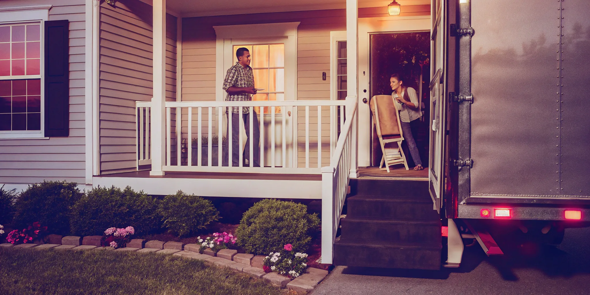 A couple loads a moving truck to sell their house fast for a new job.