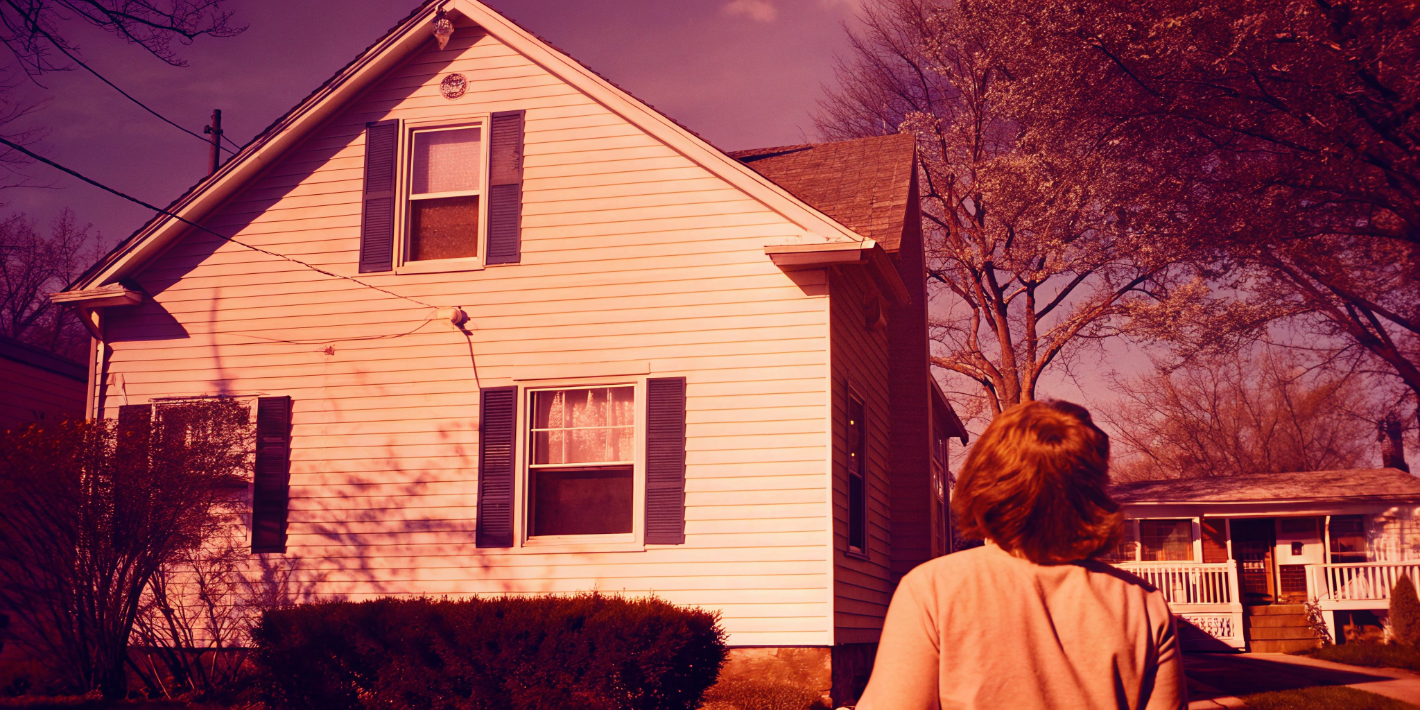 A person considers selling their home to companies that buy houses without repairs.