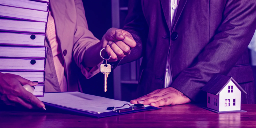 Finalizing a cash offer for a condo with keys and paperwork.