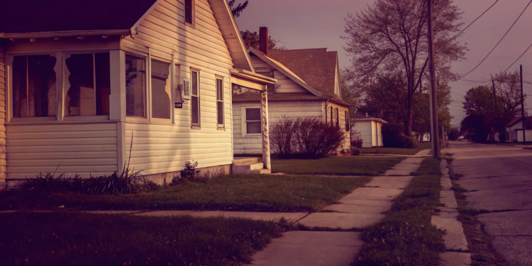A distressed property being sold to one of the buyers who purchase homes for cash.
